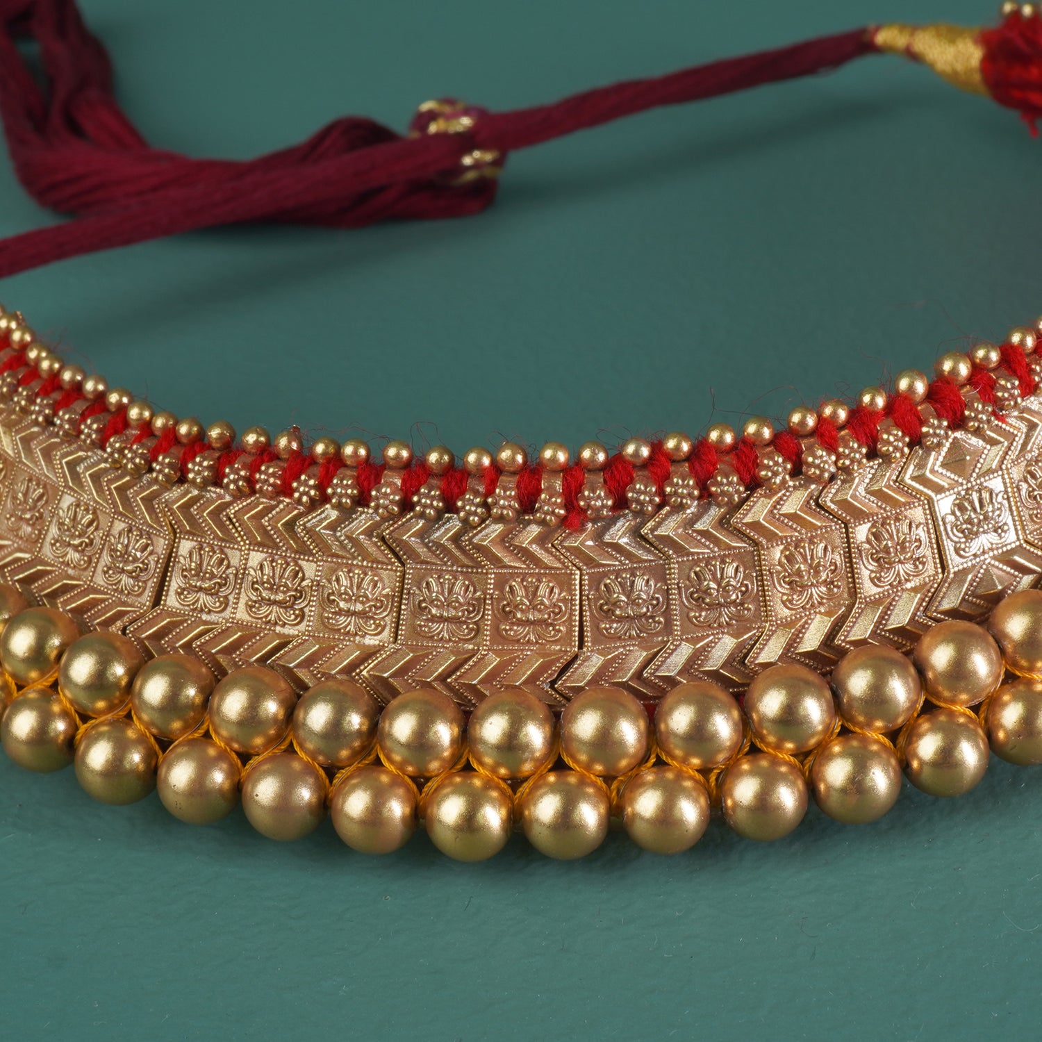 an elegant vajratik design coated in gold