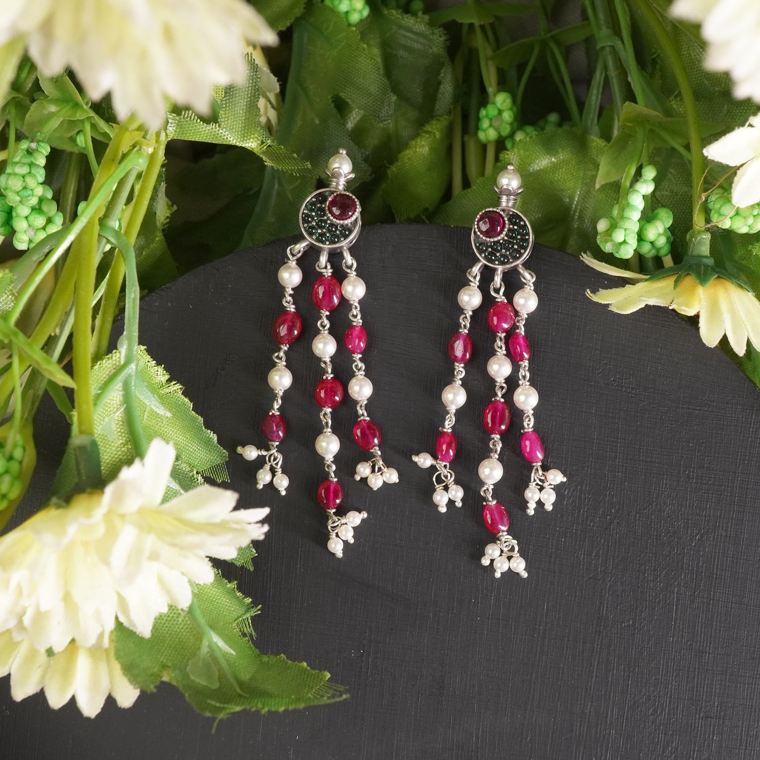 A picture of daily wear silver earrings with latkan peals