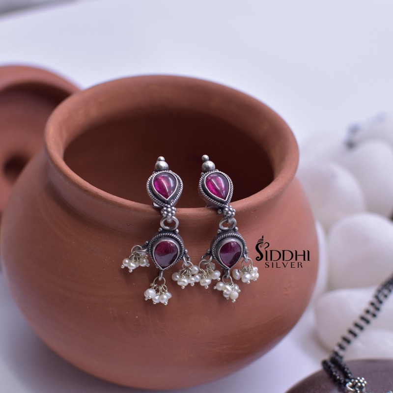 Silver tanmani earrings