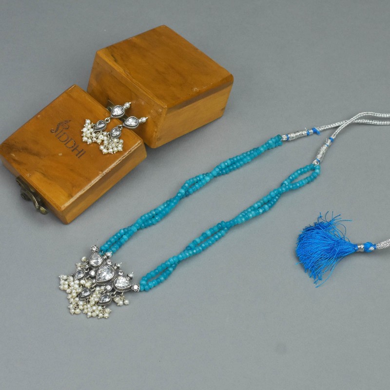 blue crystal silver tanmani necklace design.