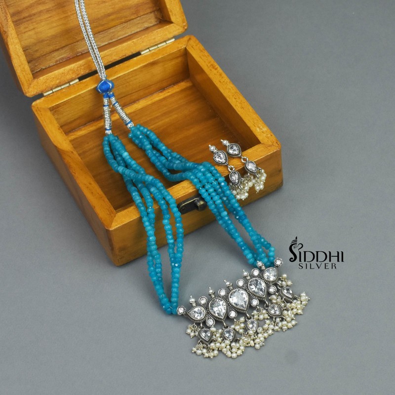 blue tanmani necklace