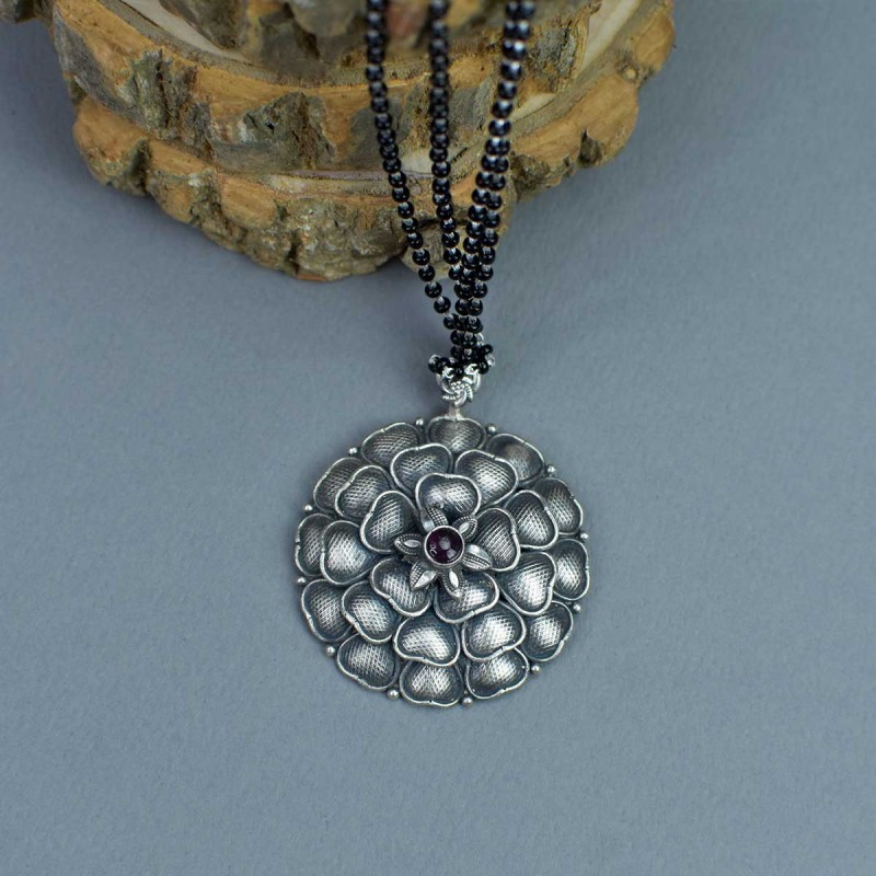 silver flower pendant