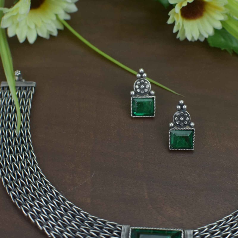 green emrald silver earrings.