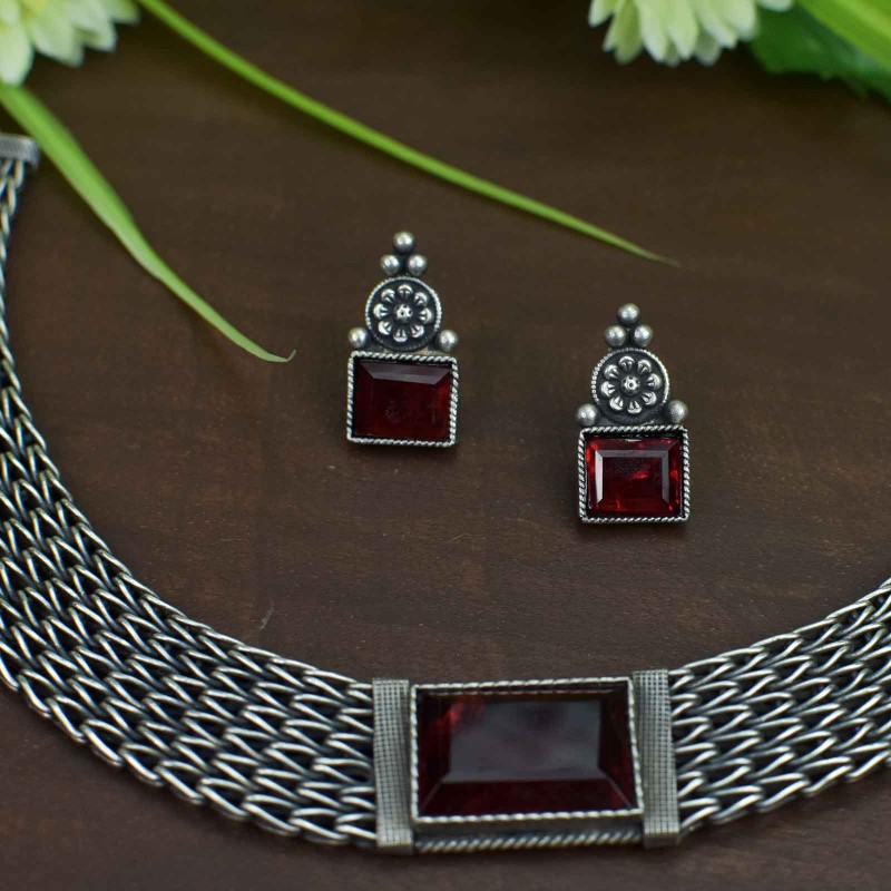 red emrald stone silver earrings.