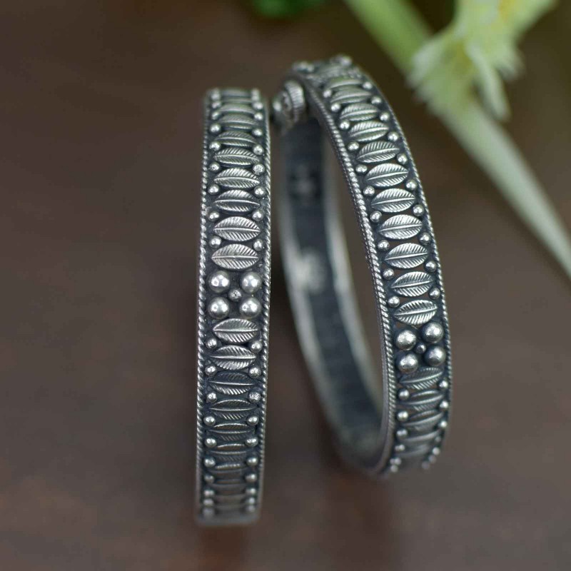 intricately crafted handmade silver bangles