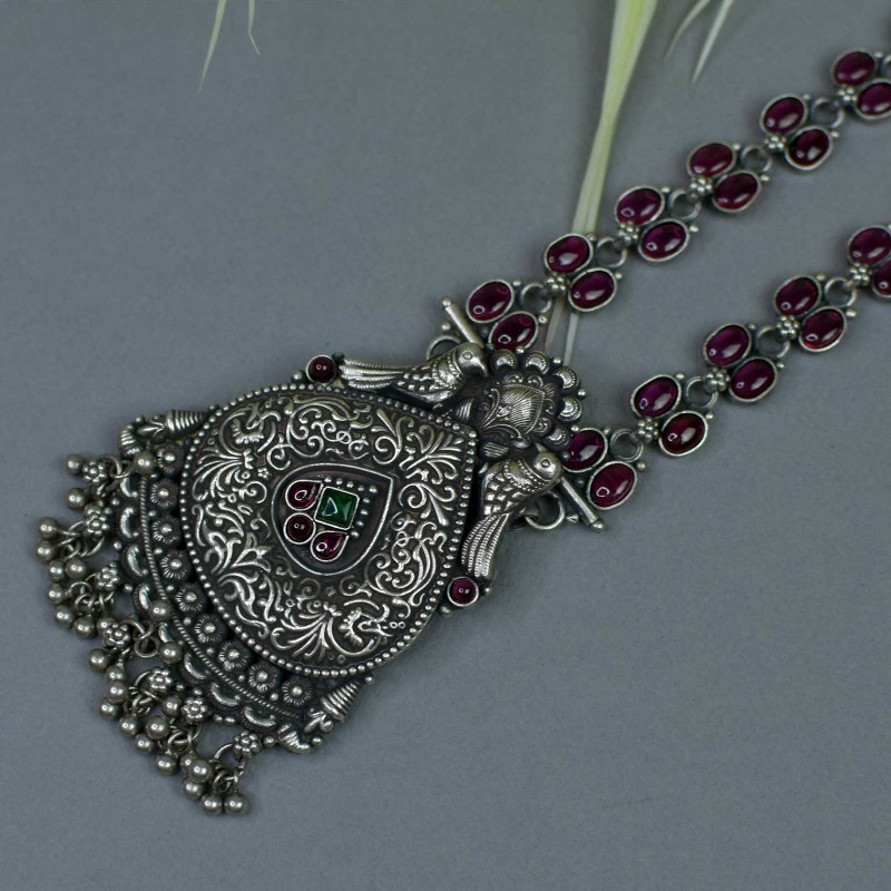 silver pendant with nakash piece and peacock design