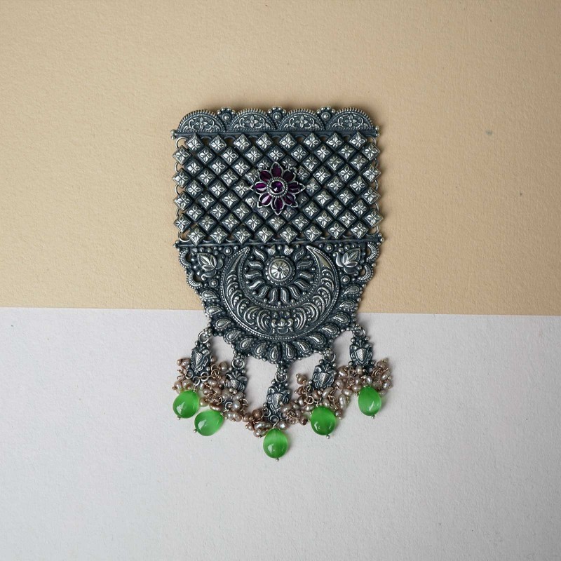 silver pendant with chandrakor cuttings
