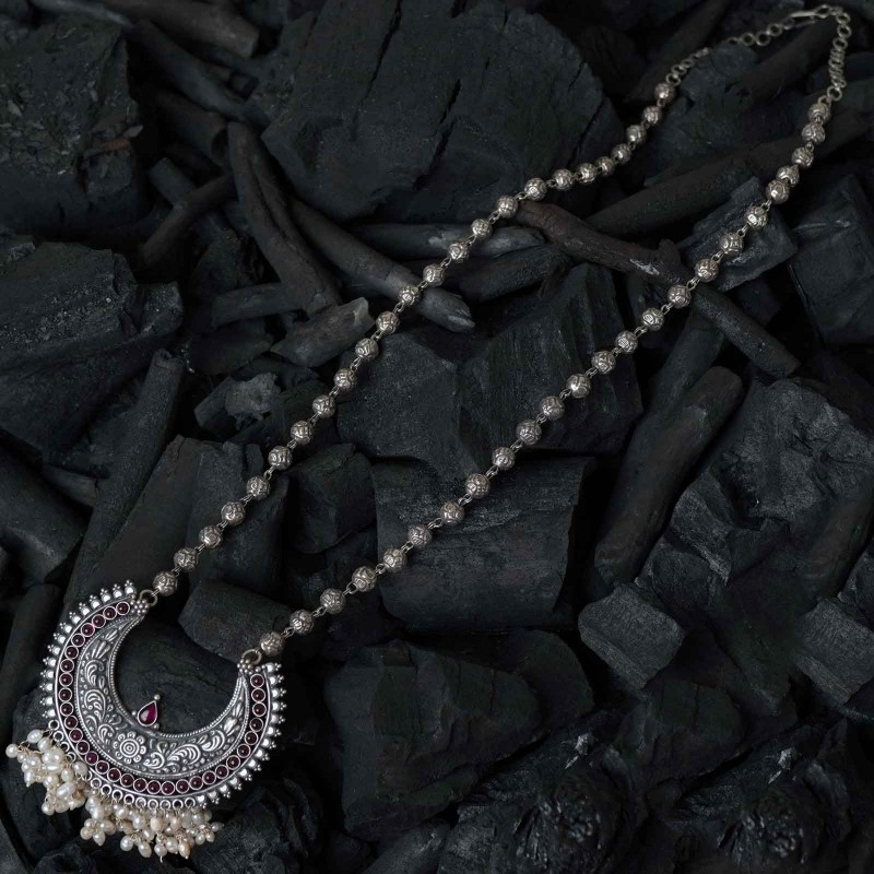 silver mohan mala long necklace with chandrokor shaped pendant studded with freshwater pearls.