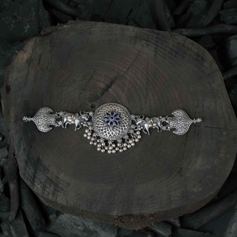 silver choker with blue stones and ghungroos