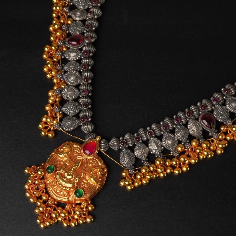 Buy dual tone hand made silver kolhapuri saaj with an laxmi pendant.