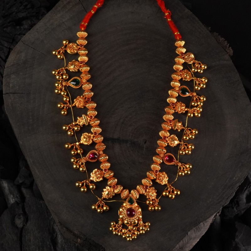 silver kolhapuri saaj with an saaj ghat pendant and dipped in gold and gheru finished