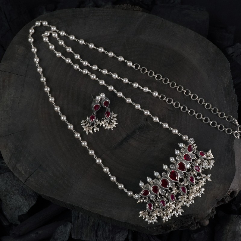 long silver tanmani with red emrald stones and matching earrings