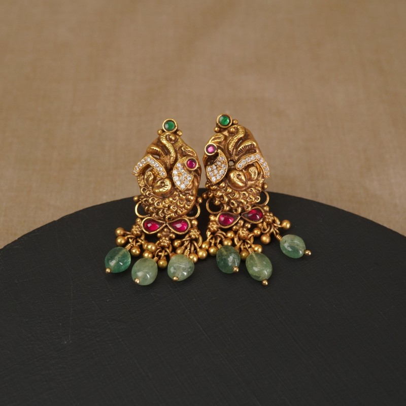 silver nakashi earrings peacock design