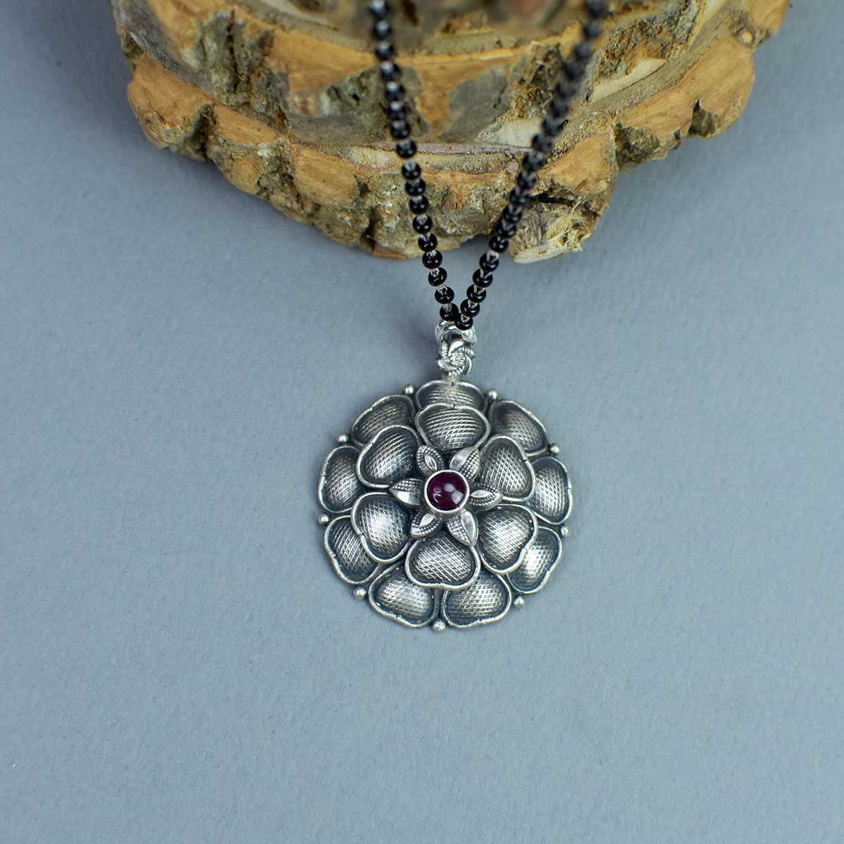 short silver chain mangalsutra with flower pendant