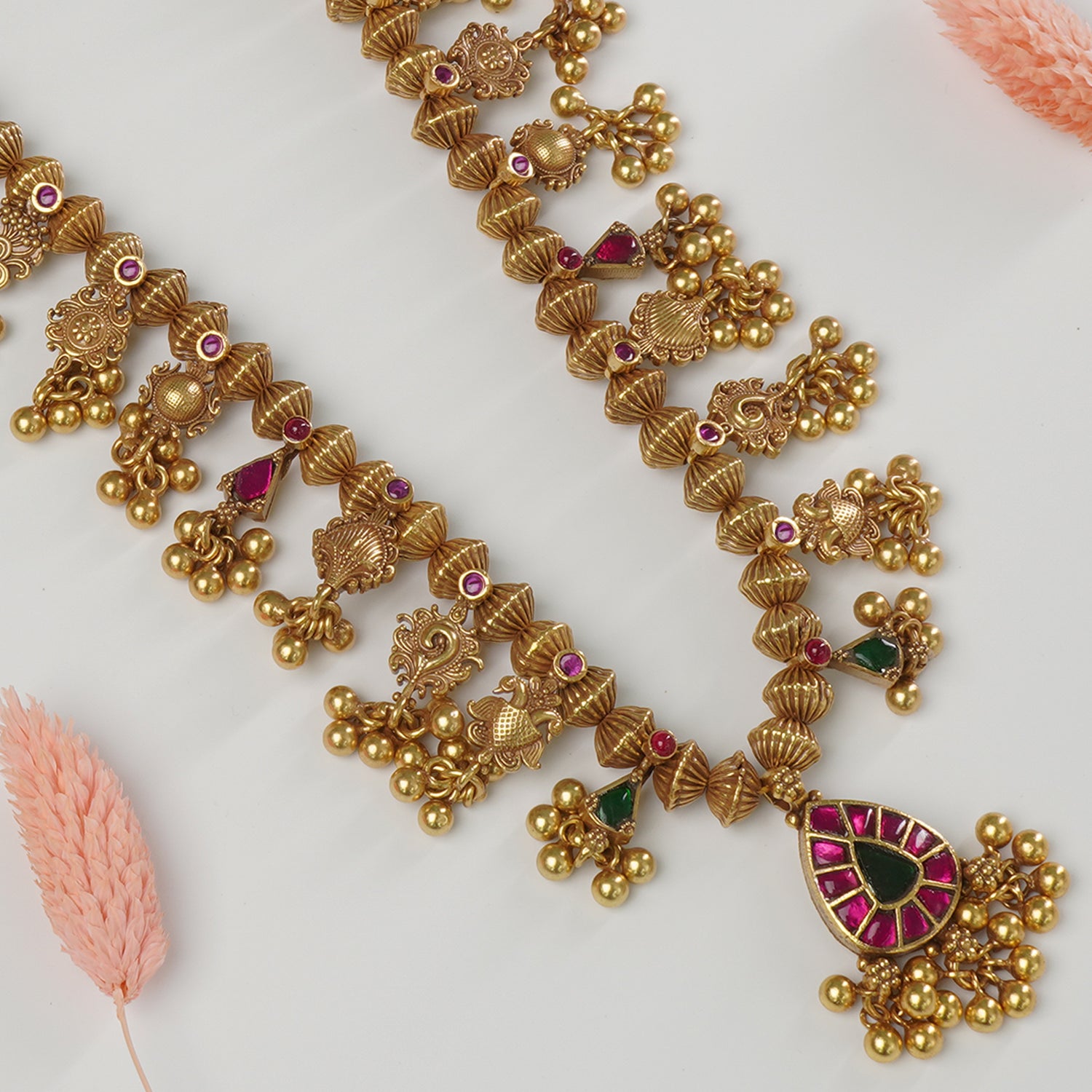Close-up of Kolhapuri Saaj motifs in 925 silver antique gold plated necklace
