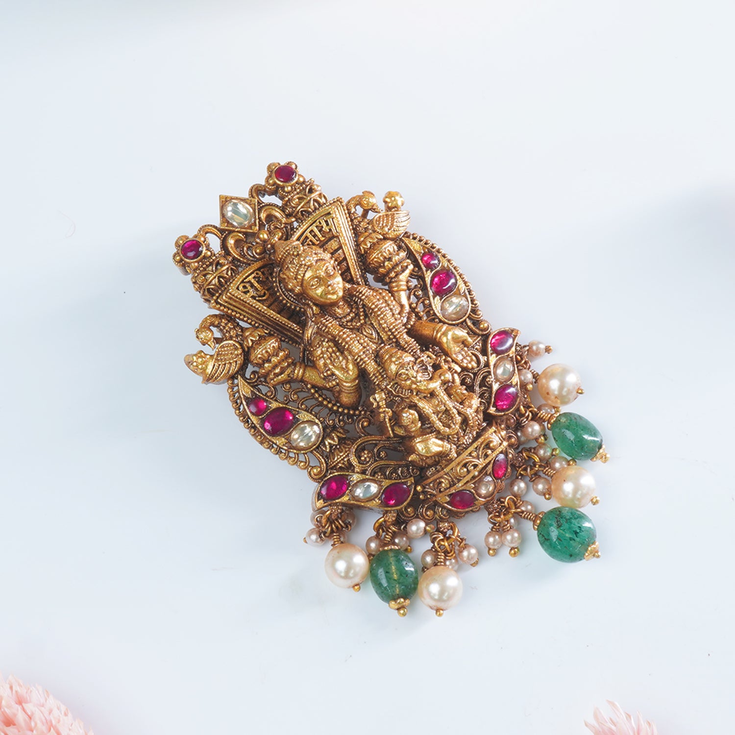 Detailed carving of Laxmi and Ganesha in 925 silver pendant