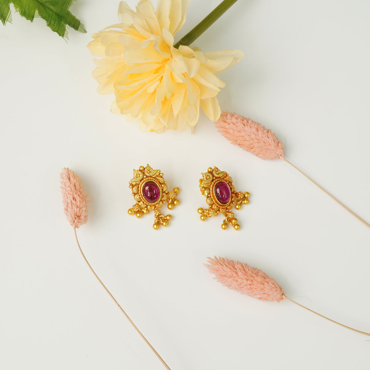 Gold plated silver studs temple design