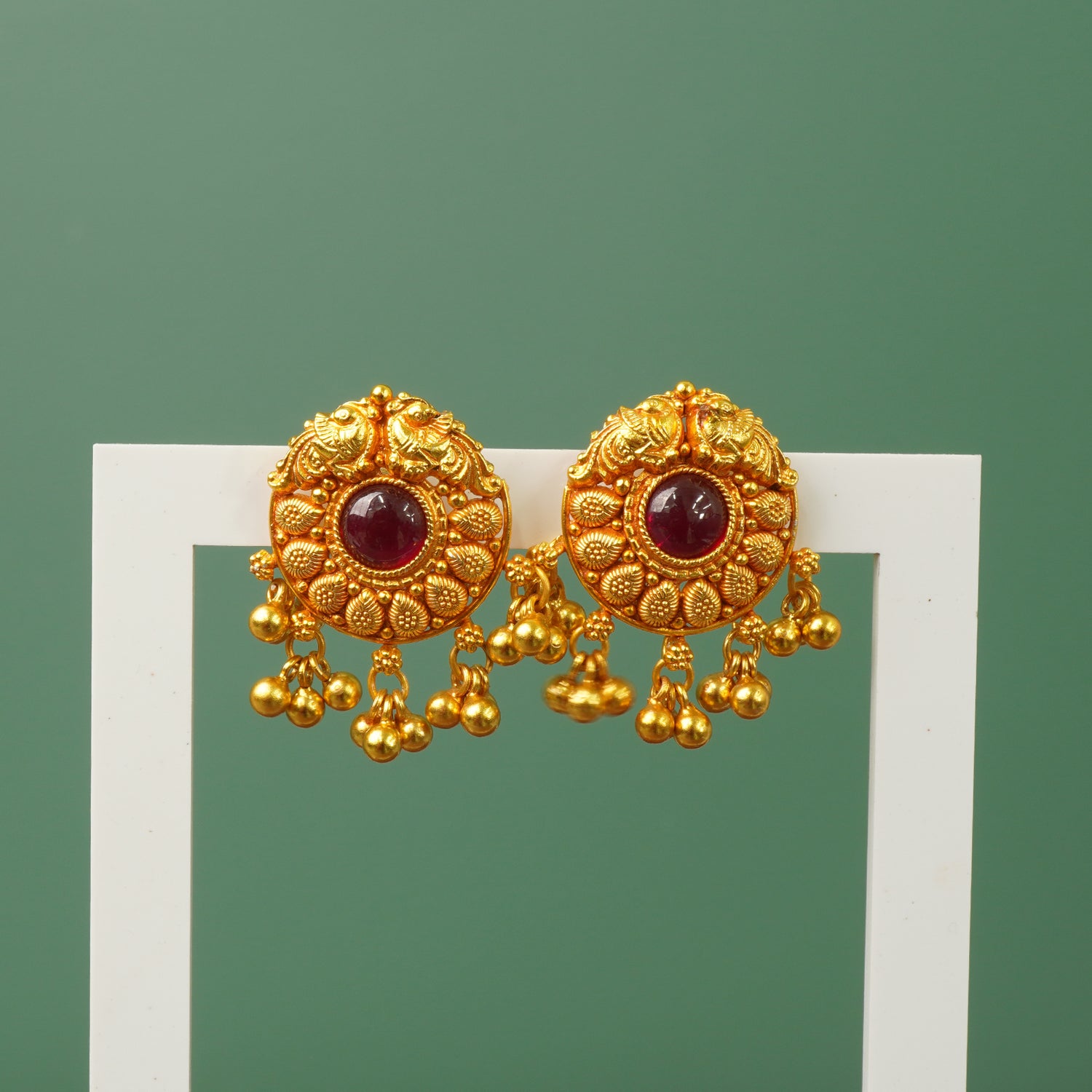 Gold plated temple silver earrings