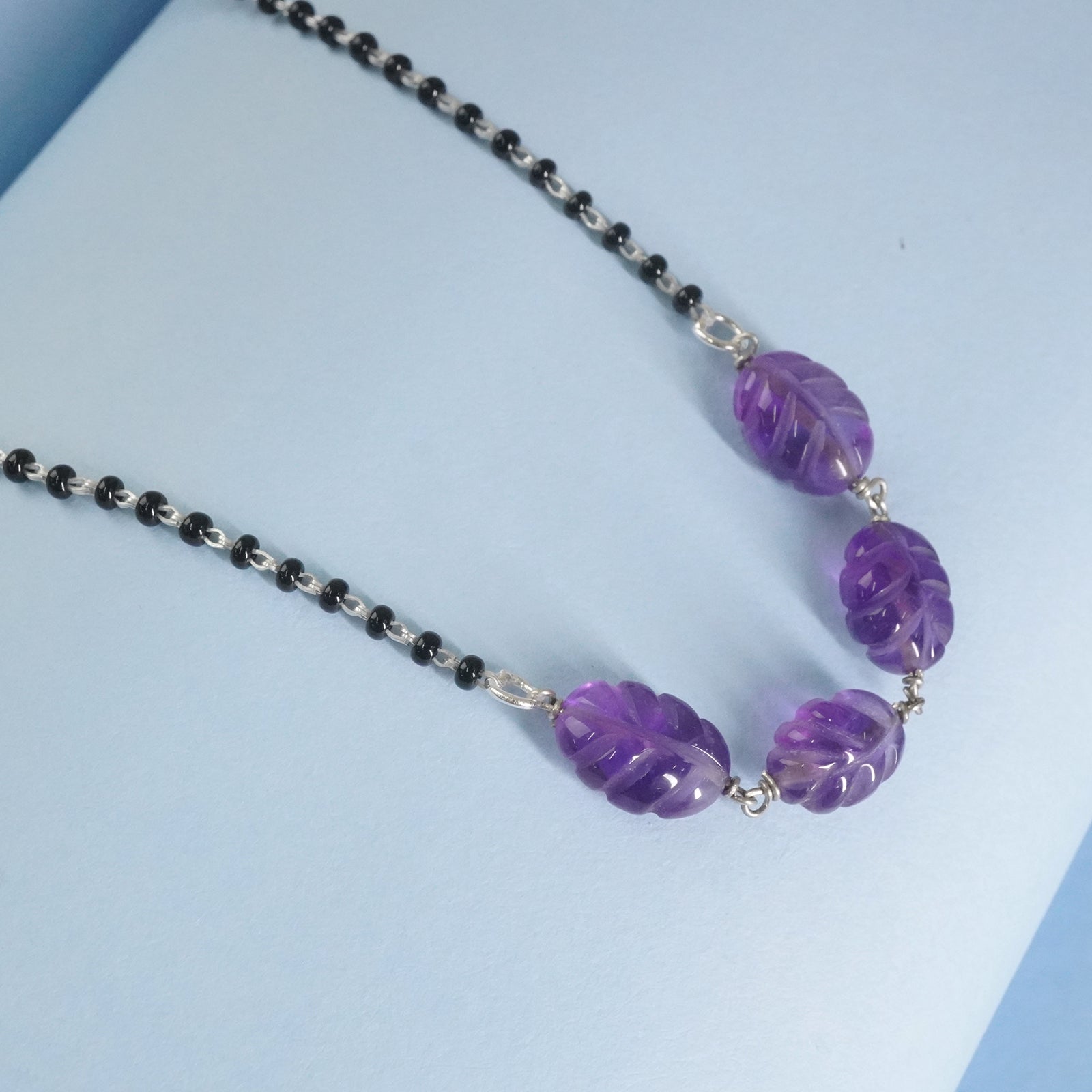 Modern silver mangalsutra design with amethyst