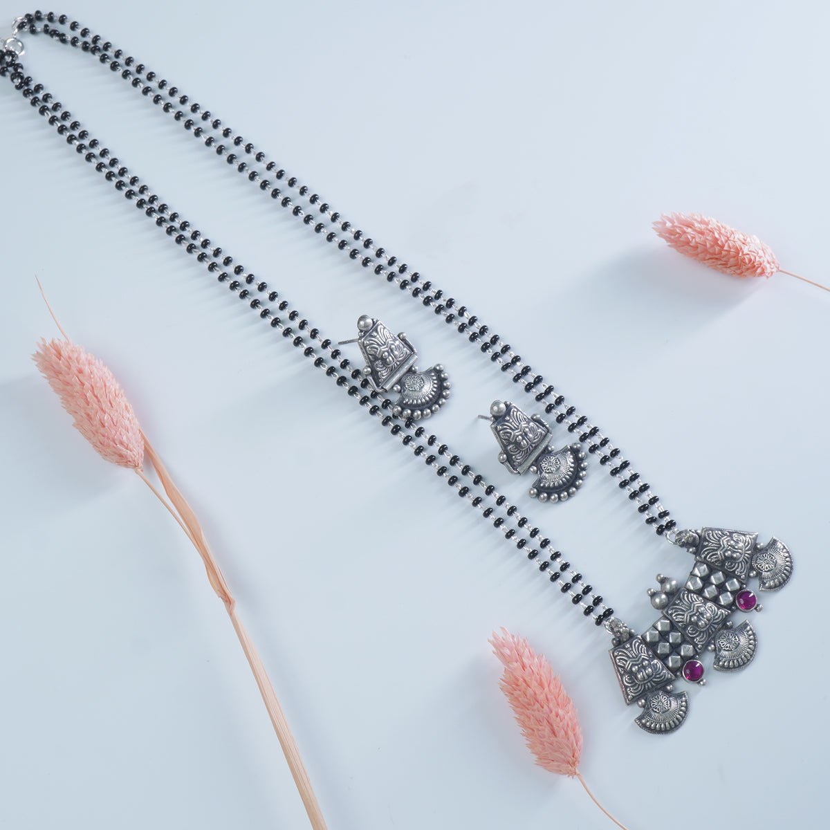 Pure 925 silver 18 inch long mangalsutra with KirthiMukh pendant and earrings
