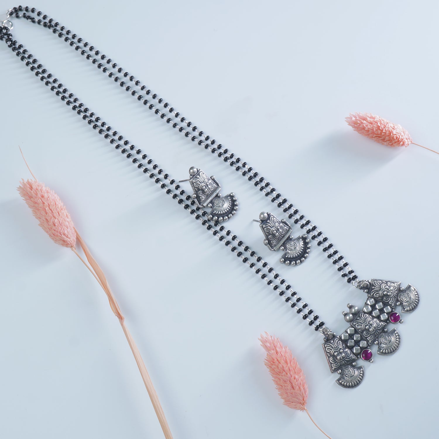 Pure 925 silver 18 inch long mangalsutra with KirthiMukh pendant and earrings
