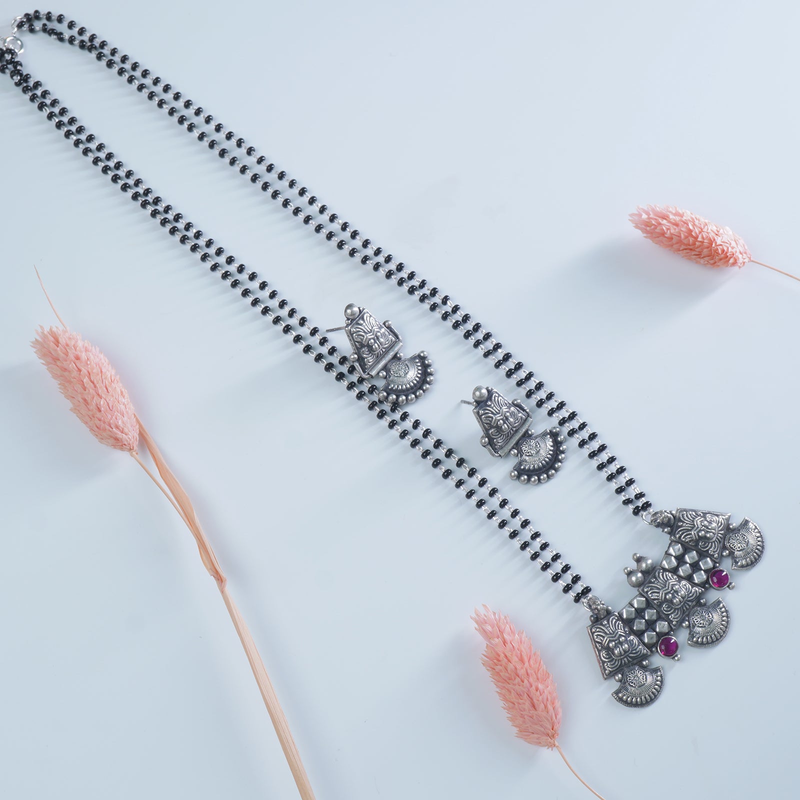 Pure 925 silver 18 inch long mangalsutra with KirthiMukh pendant and earrings
