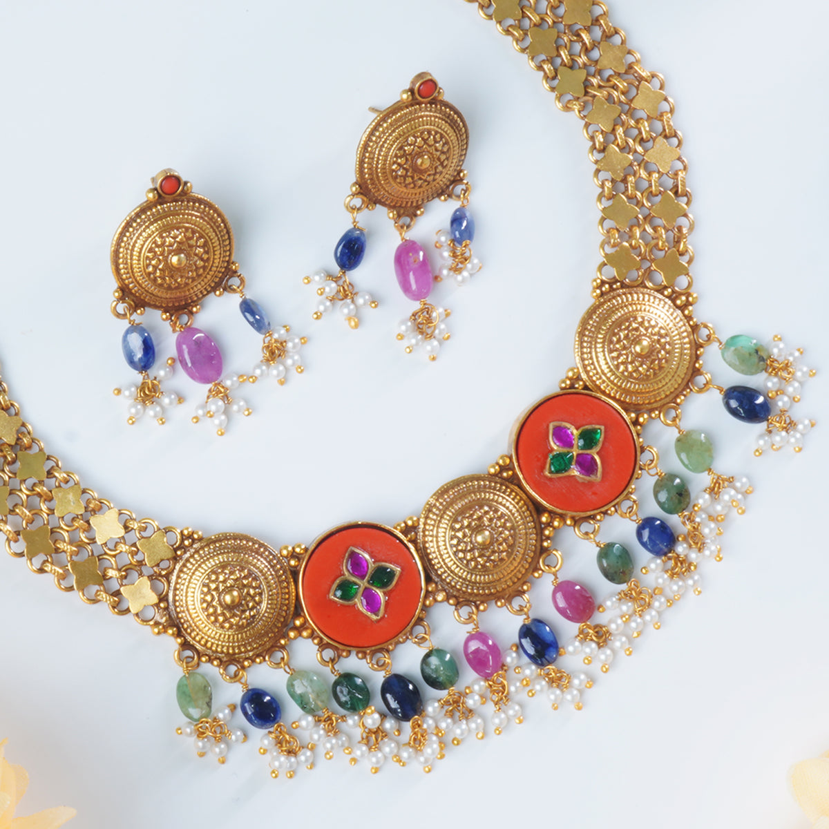 Silver necklace with coral pieces gold plated