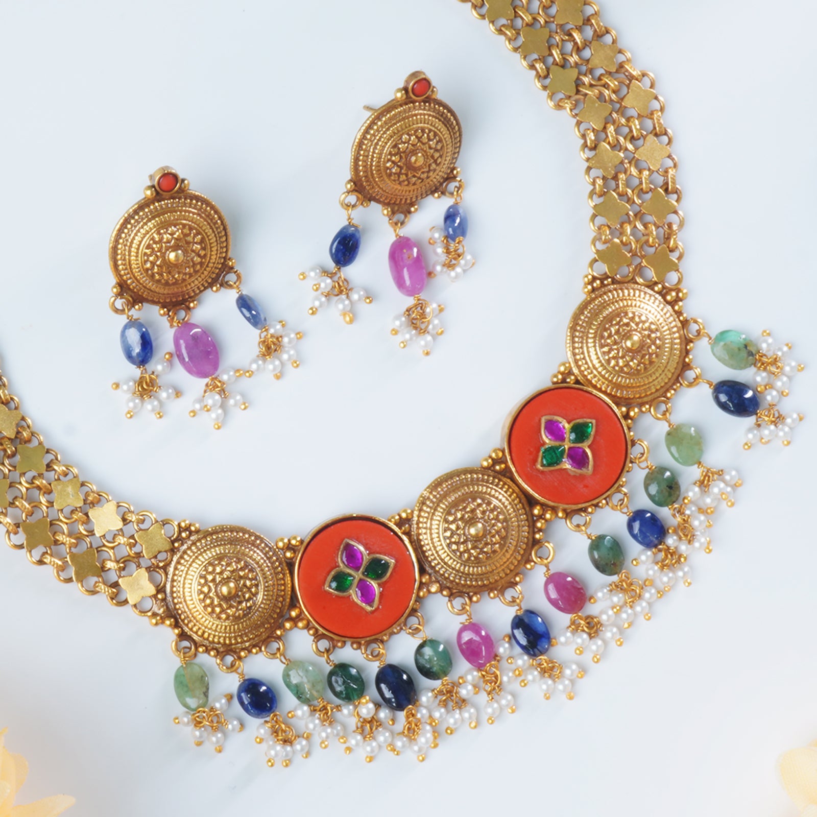 Silver necklace with coral pieces gold plated