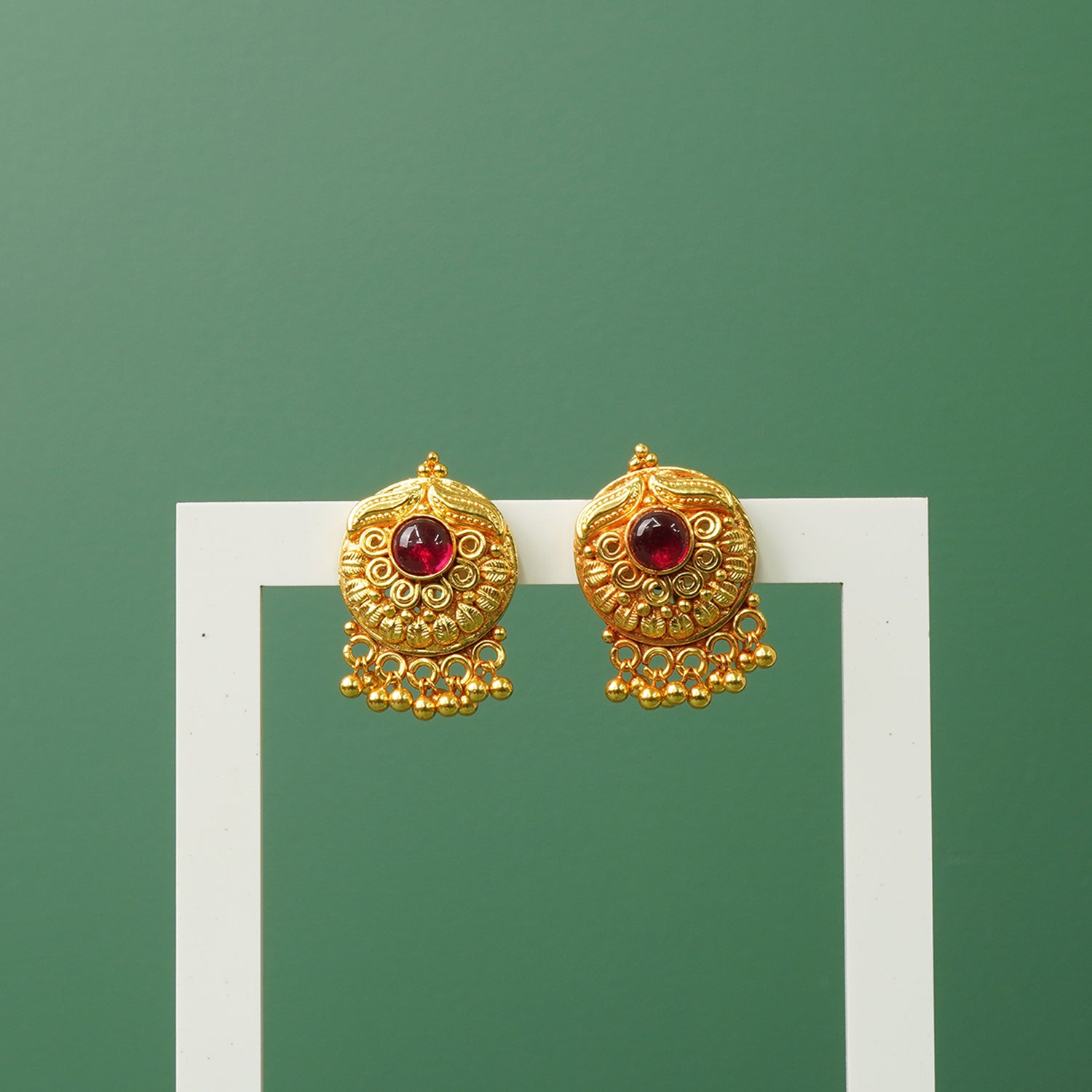 Silver studs that look like gold