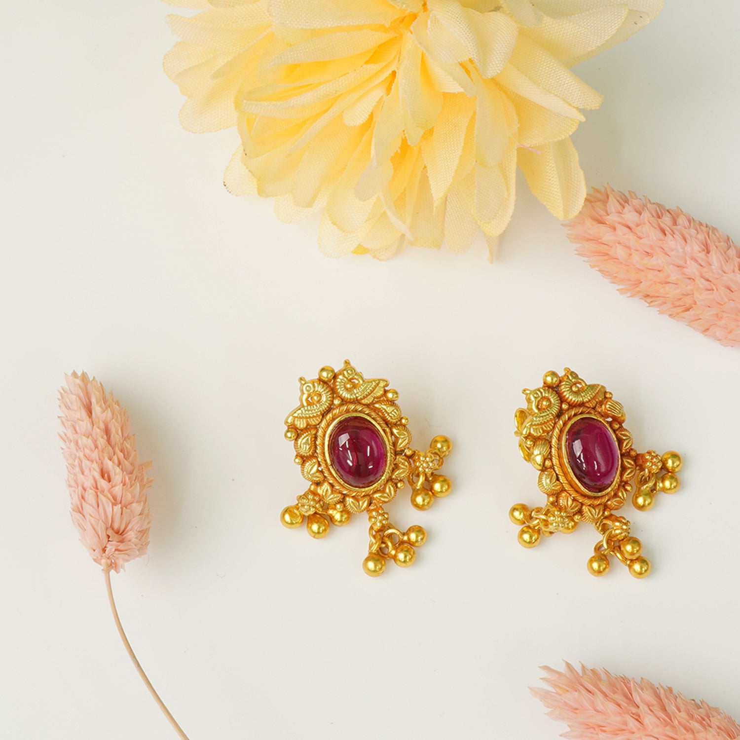 Silver studs that look like gold detail