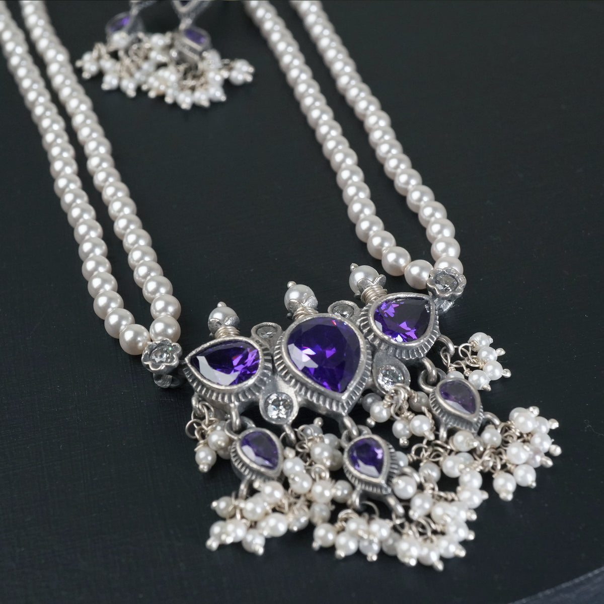 Silver tanmani amethyst pendant detail