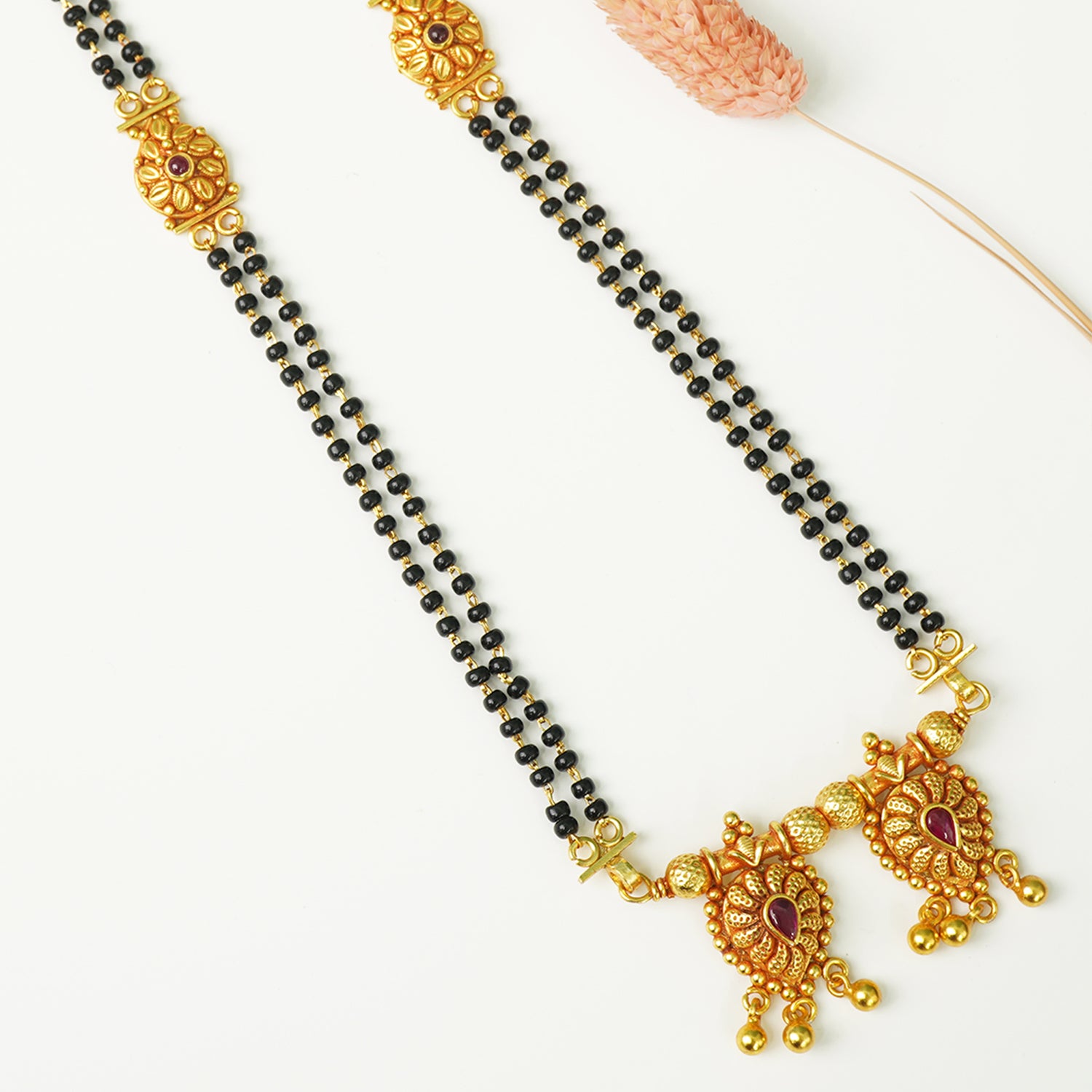 Shop Silver Gold Plated Short Paan Vati Mangalsutra Designs Online