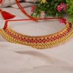 gold plated silver kolhapuri thushi with red kundan stones