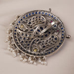 Handcrafted Silver Pendant studded with blue kemp stones