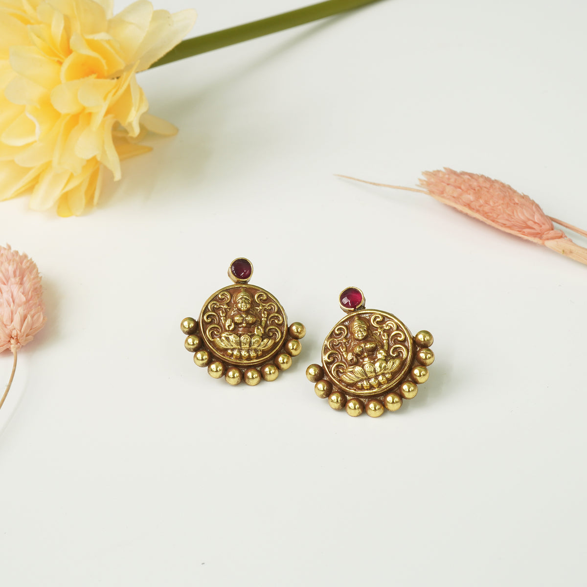 handmade gold plated Laxmi earrings in silver