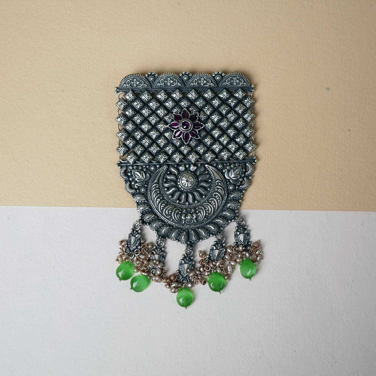 silver pendant with chandrakor cuttings