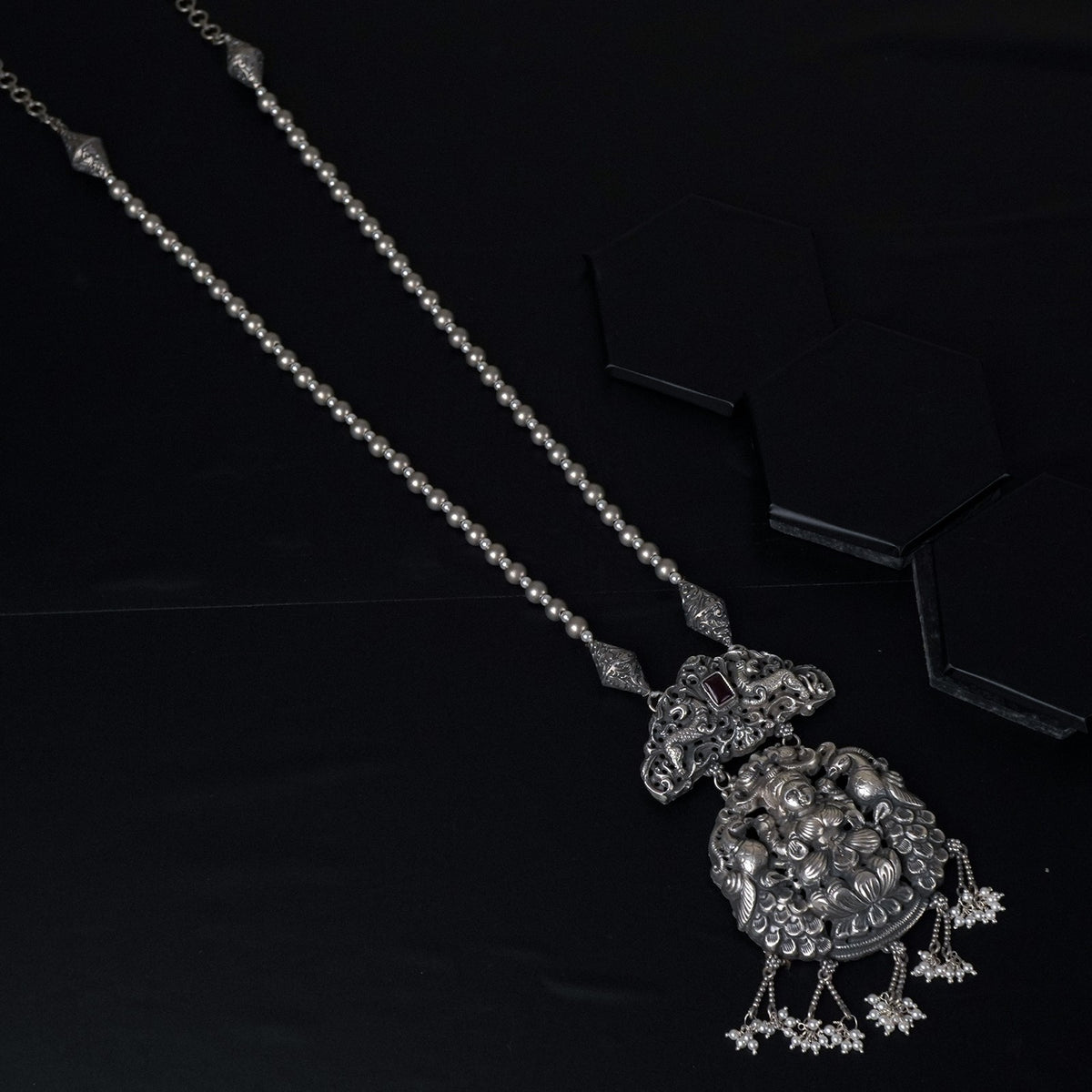 Intricately Designed Laxmi Pendant on Traditional Silver Necklace