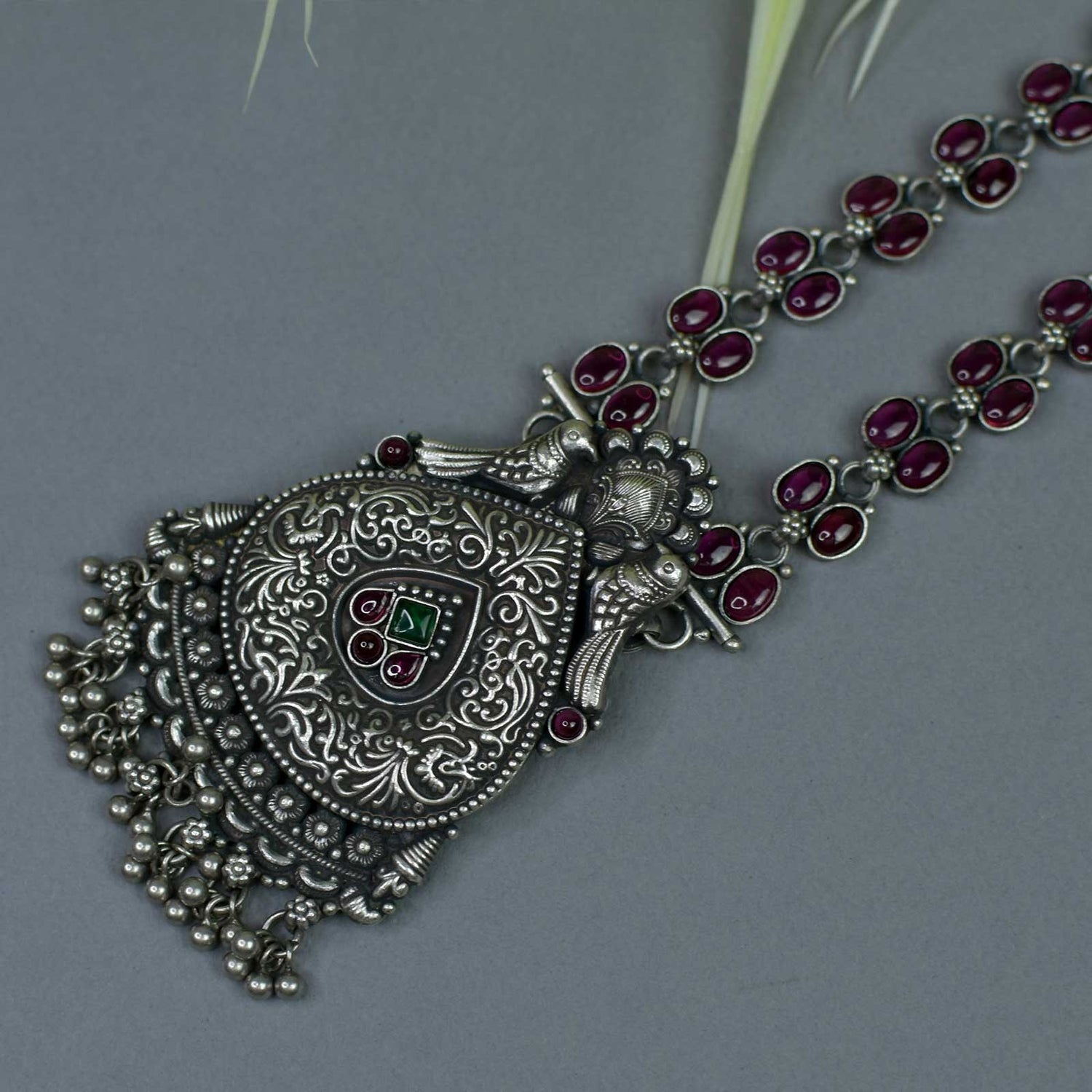 silver pendant with nakash piece and peacock design