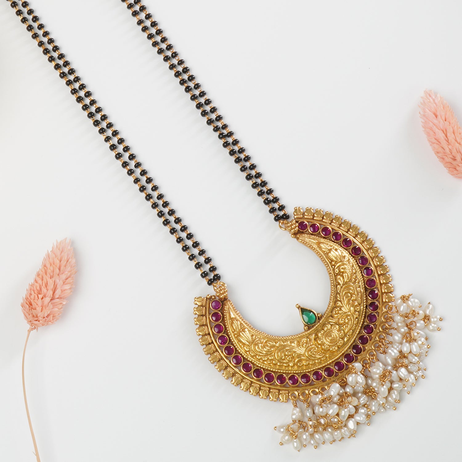 Pure silver gold plated mangalsutra design with handmade pearl studded silver pendant.