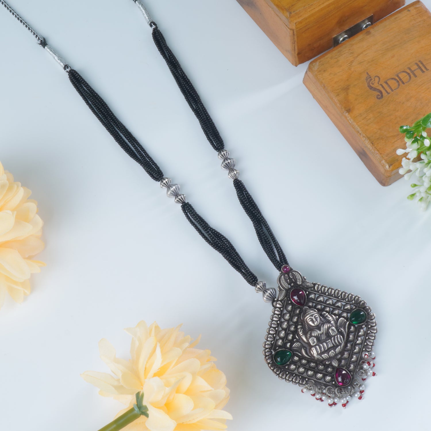 Black Beads Silver Mangalsutra Design With HandCarved Pendants