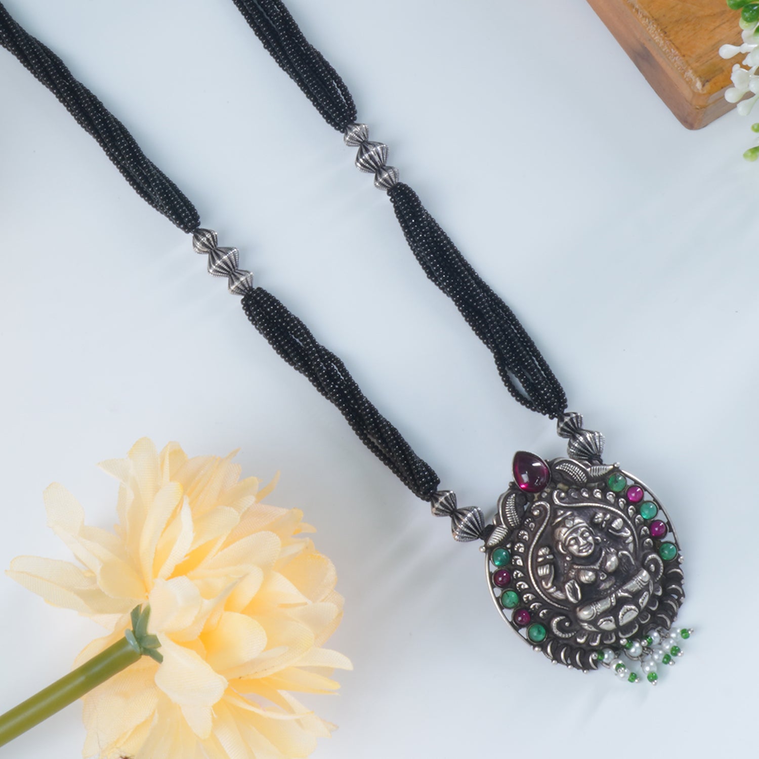 Buy Black Beads Silver Mangalsutra Design With HandCarved Pendant Design