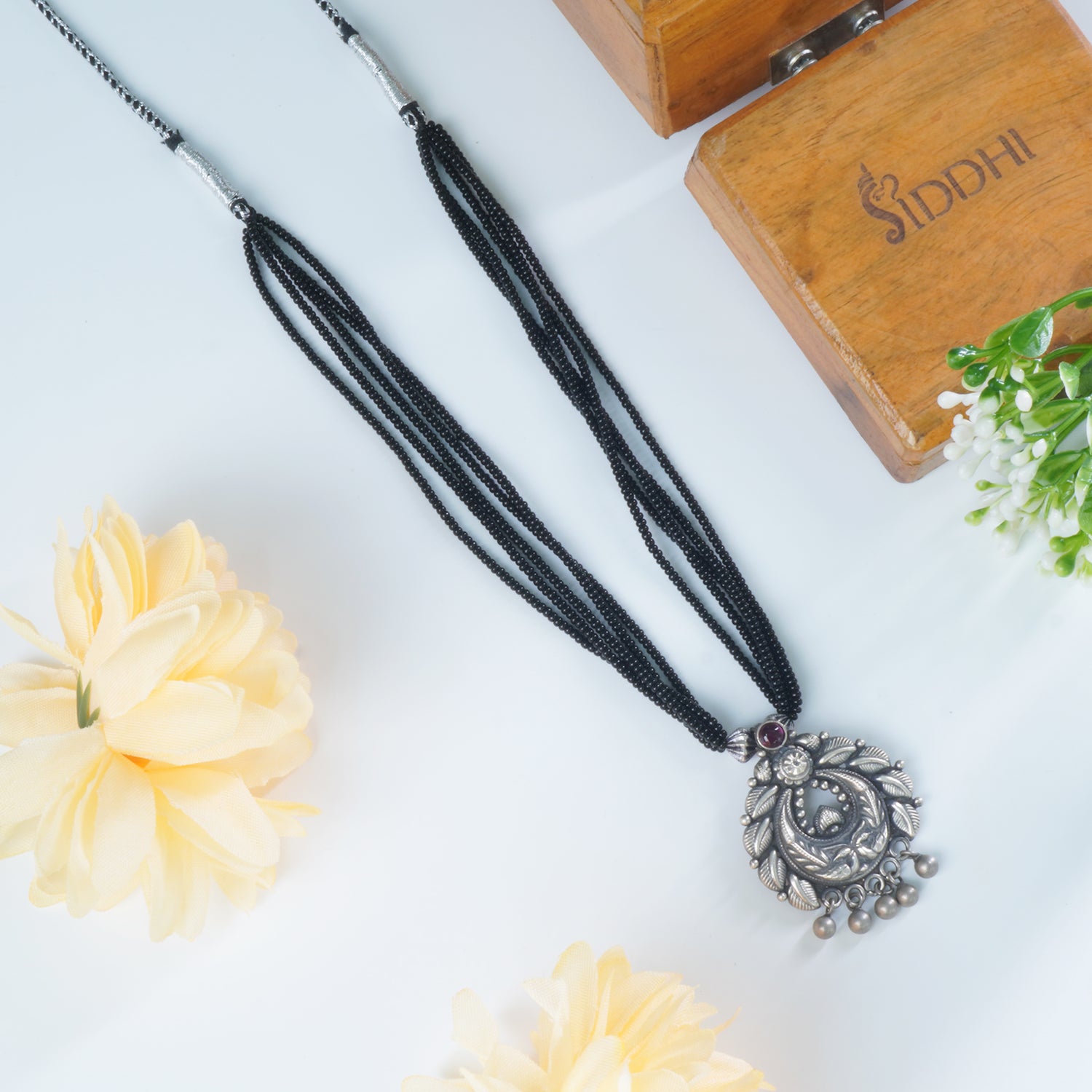 Buy Black Beads Silver Mangalsutra Design With Chandrakor Pendant