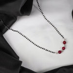 minimal silver mangalsutra with red beads