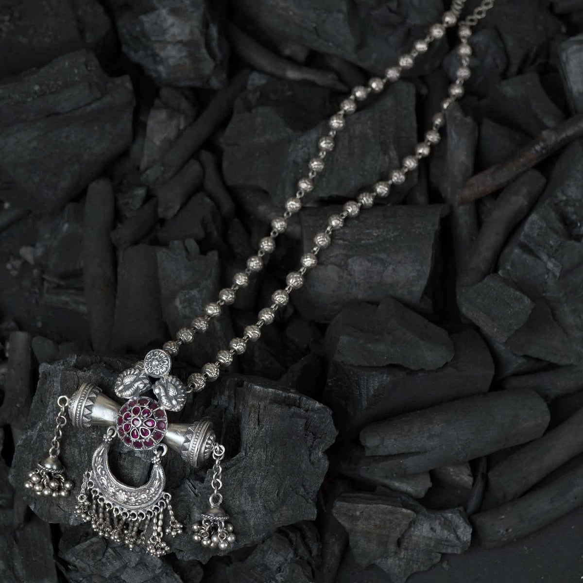 silver mohanmala necklace with an silver pendant