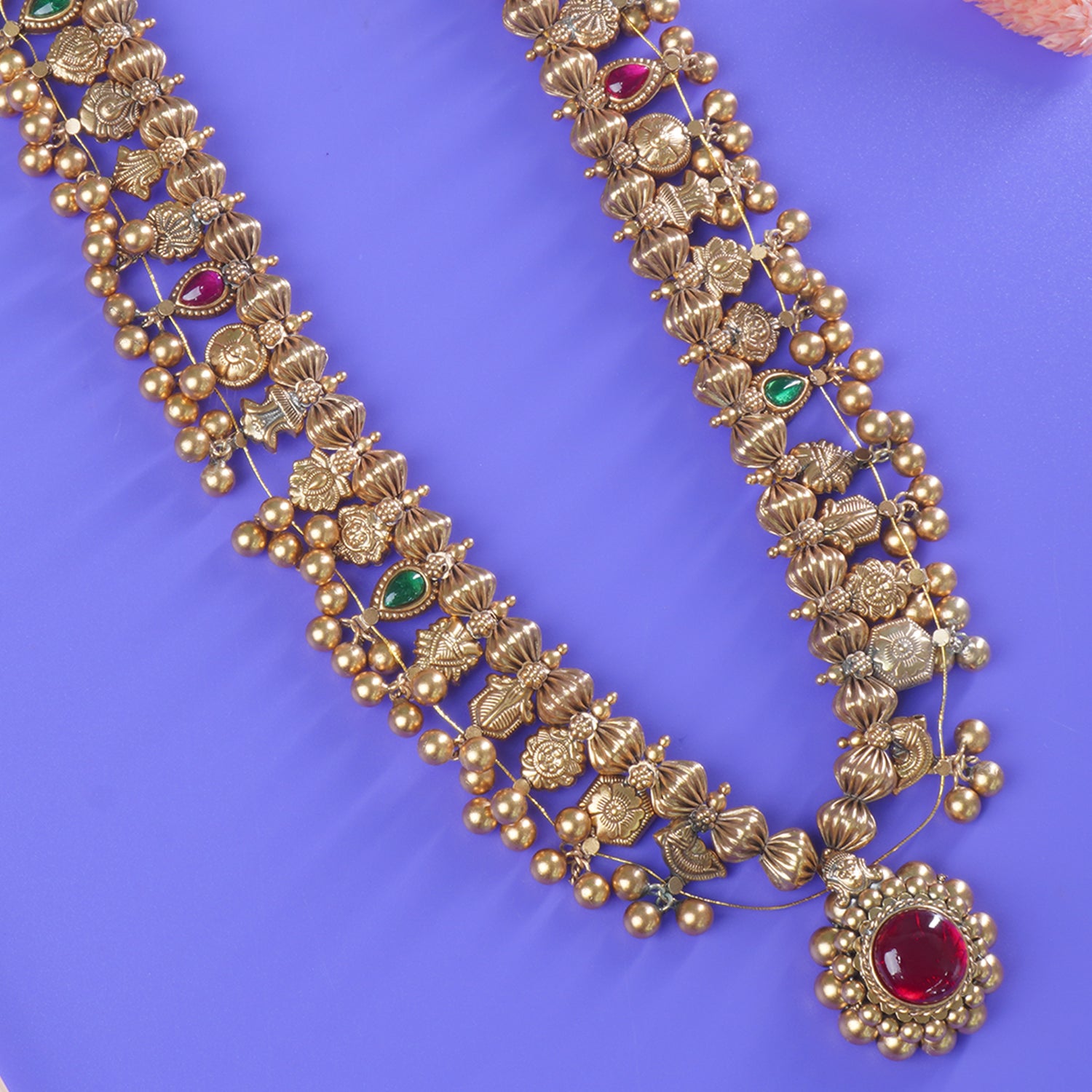 closeup of gold plated silver saaj design