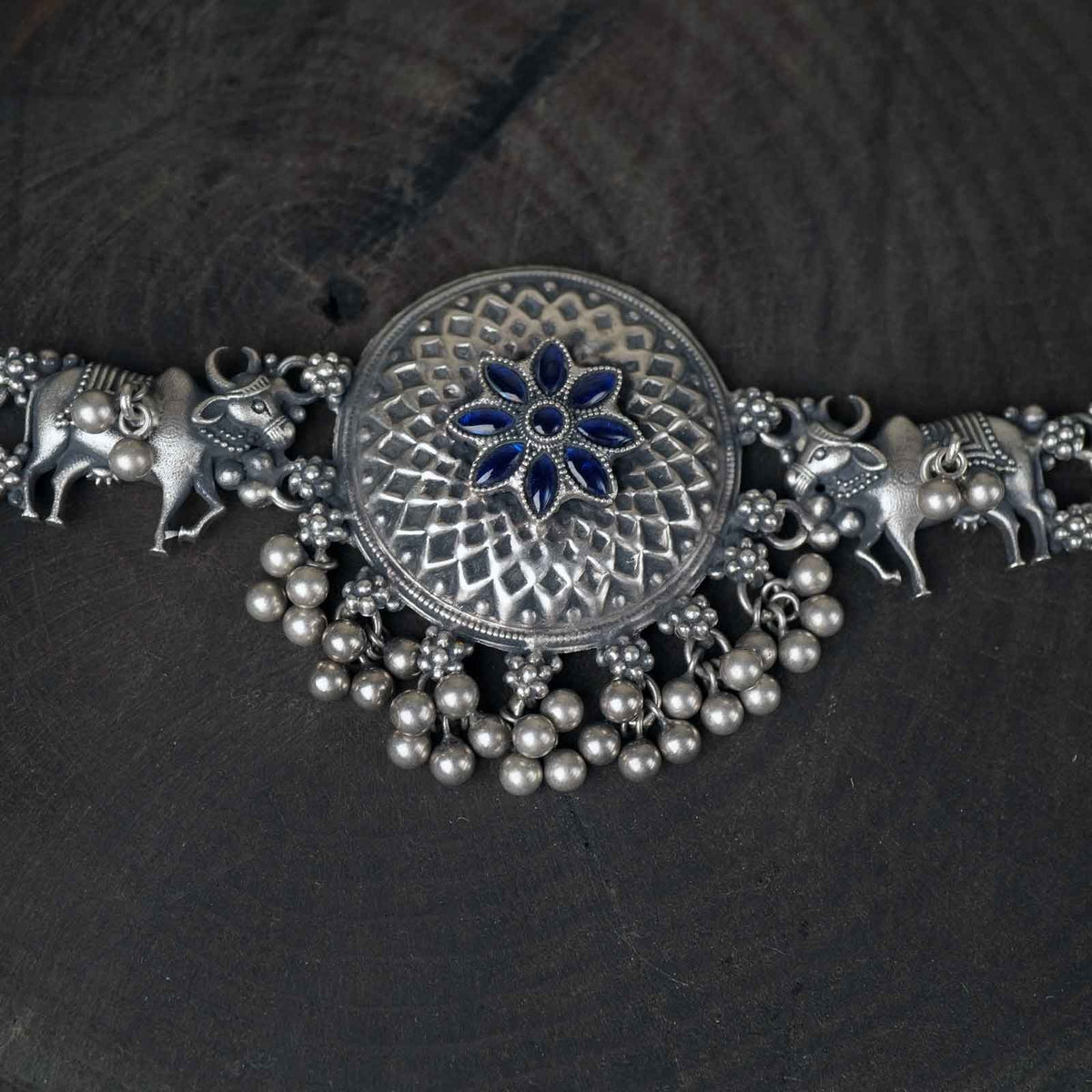 silver choker with blue stones and ghungroos