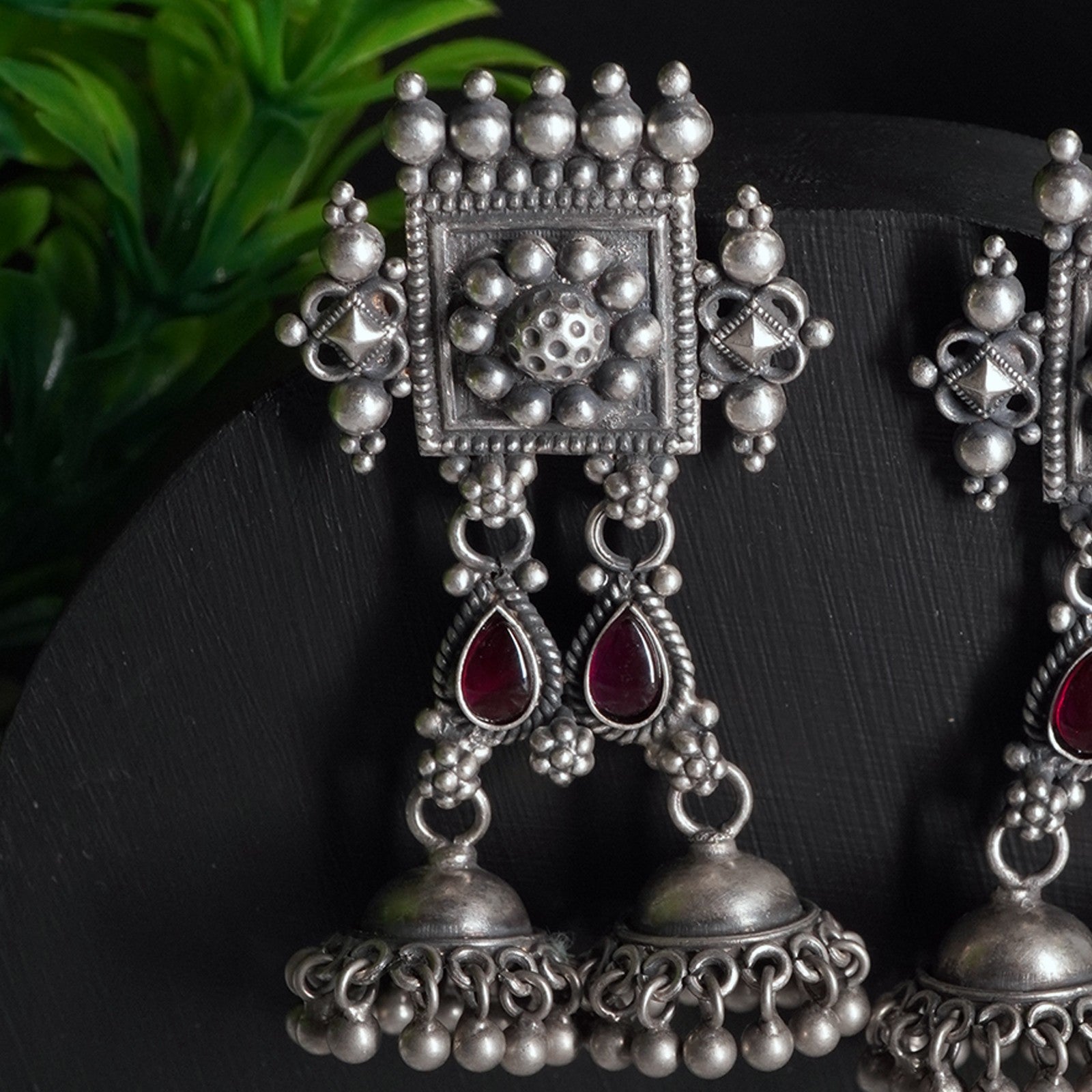 hand made silver jhumkas with dual red kemp stones