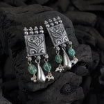 regal silver earrings