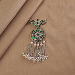 silver jadau kundan pendant with green kundan