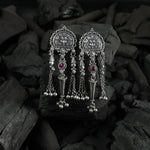 handmade silver jhumka design with kirthimukh pattern